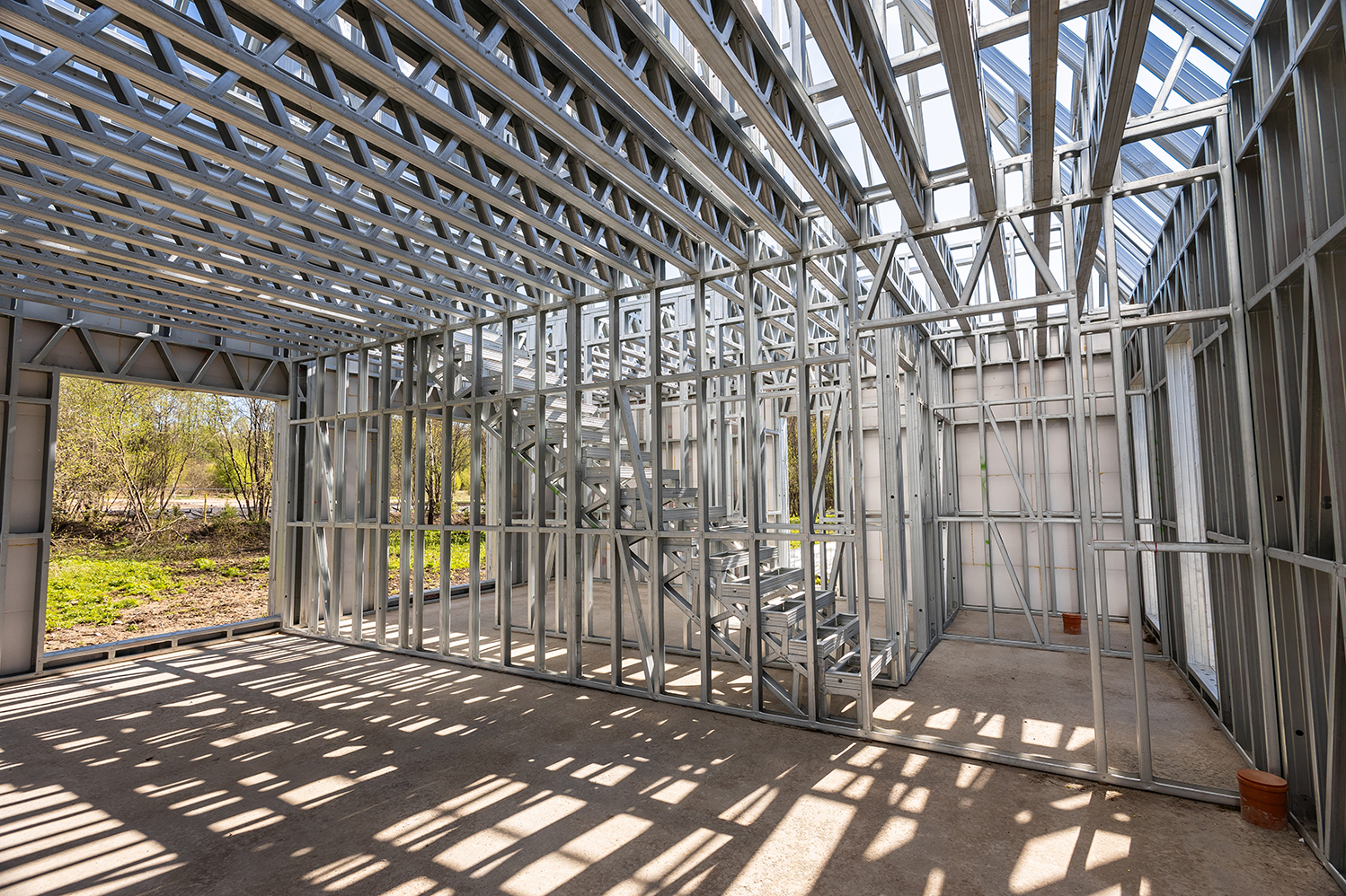 Light gauge steel framing system used for house construction. Wall to be clad with fibre cement board. Metal frame of newly built building. Construction of a new house